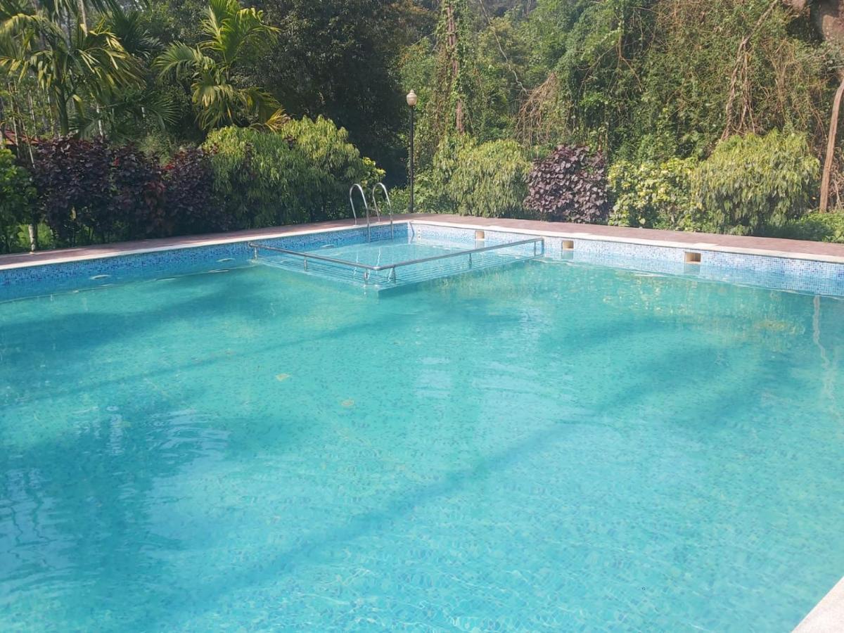 Ezzenza Areca Resort Madikeri Exteriör bild