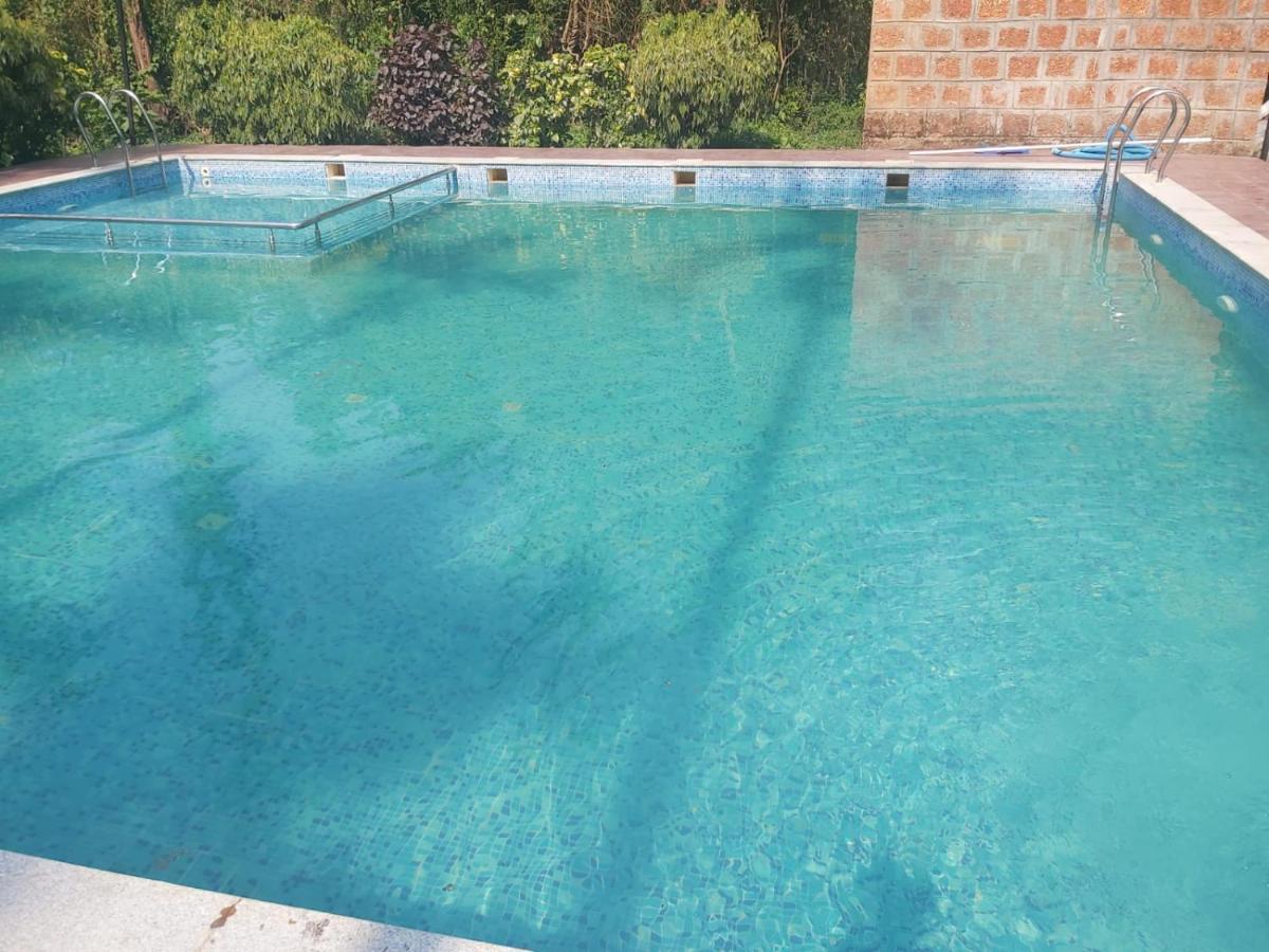 Ezzenza Areca Resort Madikeri Exteriör bild